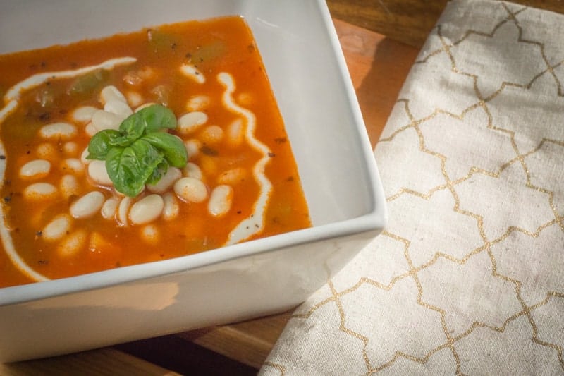 soup for lunch, photo by Sarah Carson A bowl of Serbian white bean soup with basil.