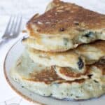 Stack of blueberry sourdough pancakes.