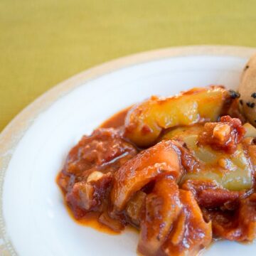 Ukrainian bell pepper lecho served with a bun