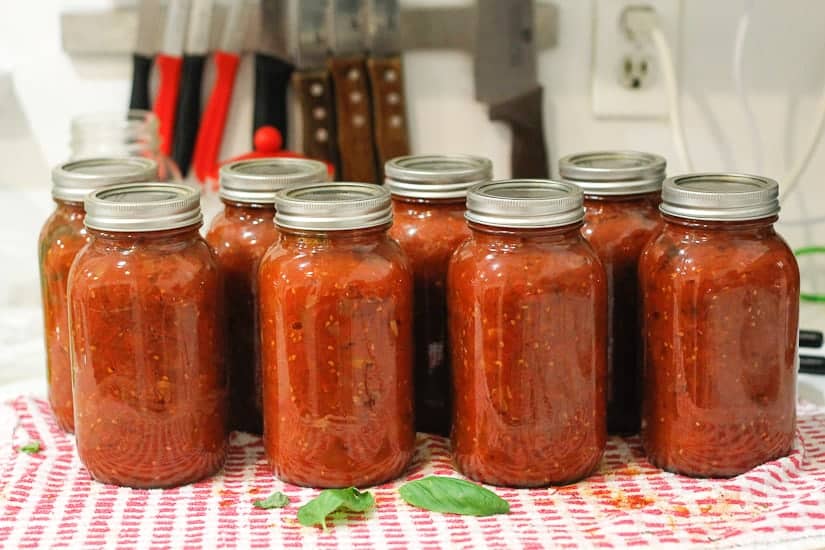 Canned jars of chunky tomato sauce