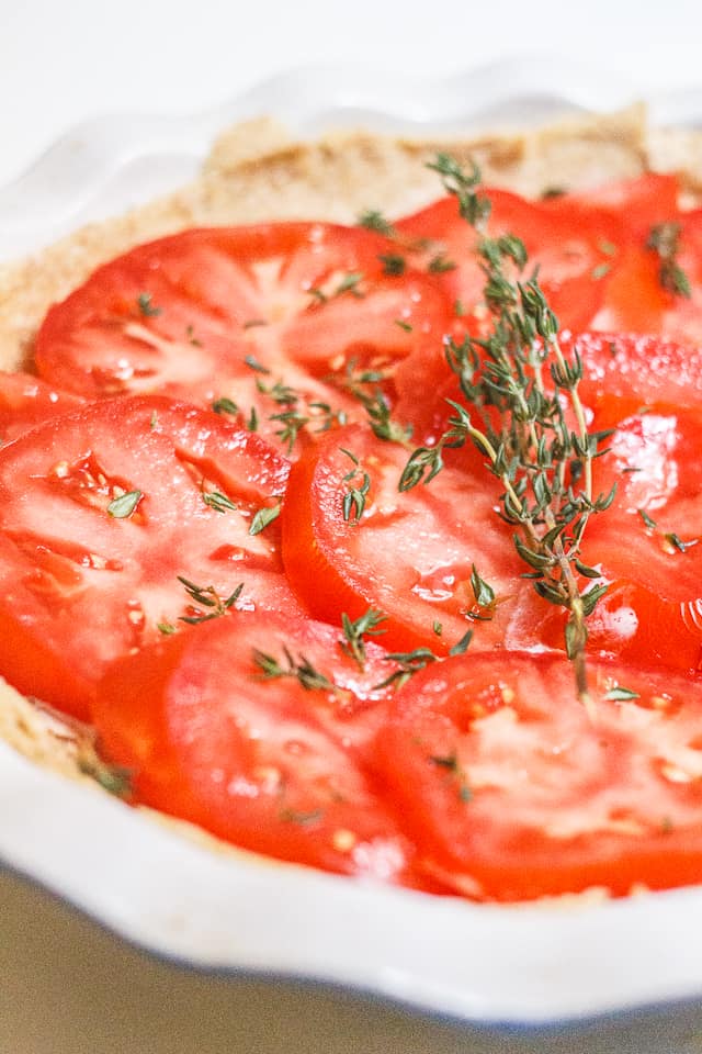 Summer's last tomato tart - Encapsulated in a an olive-oil crust, this tomato tart is full of tangy (vegan) mayonnaise, sharp, grainy mustard, and the summer's last tomatoes.