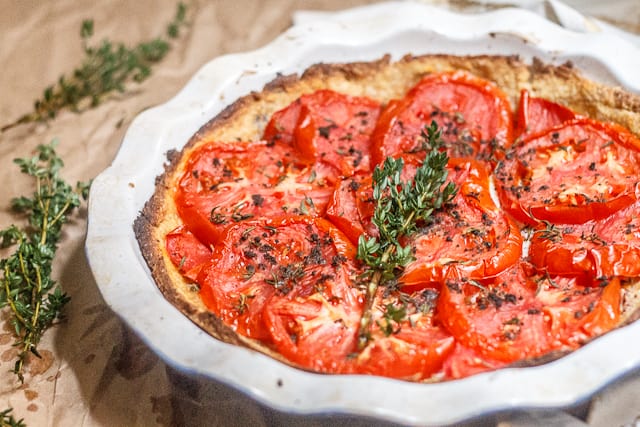 Summer's last tomato tart - Encapsulated in a an olive-oil crust, this tomato tart is full of tangy (vegan) mayonnaise, sharp, grainy mustard, and the summer's last tomatoes.