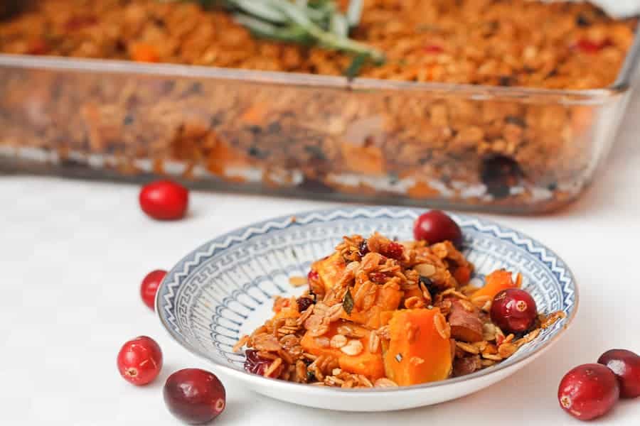 Sweet potato, almond and cranberry casserole with berry granola crumble