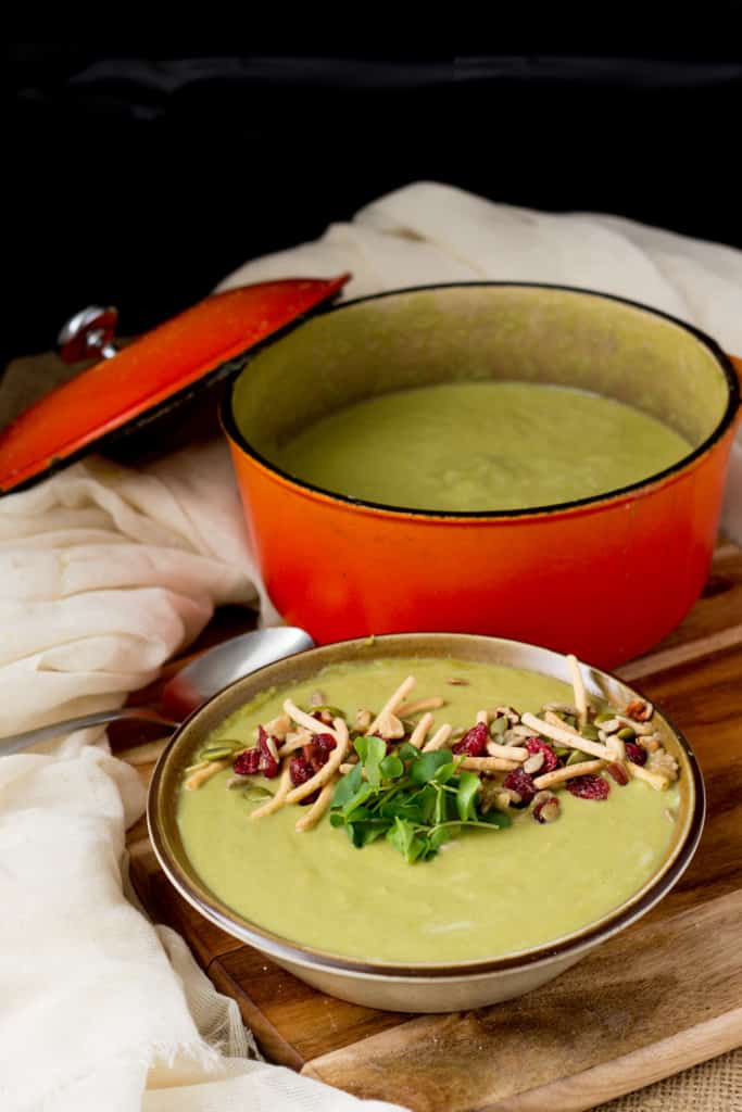 Creamy broccoli stems soup with salad topper crunch
