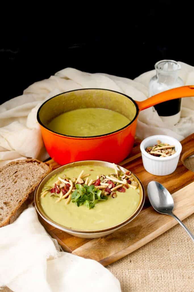 Creamy broccoli stems soup with salad topper crunch