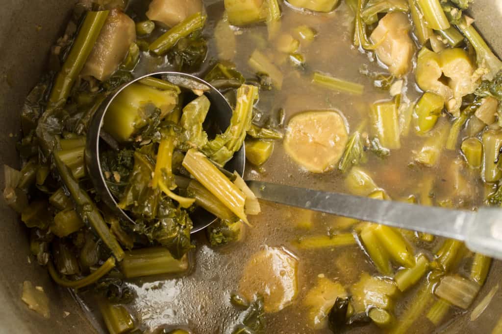 Creamy broccoli stems soup with salad topper crunch