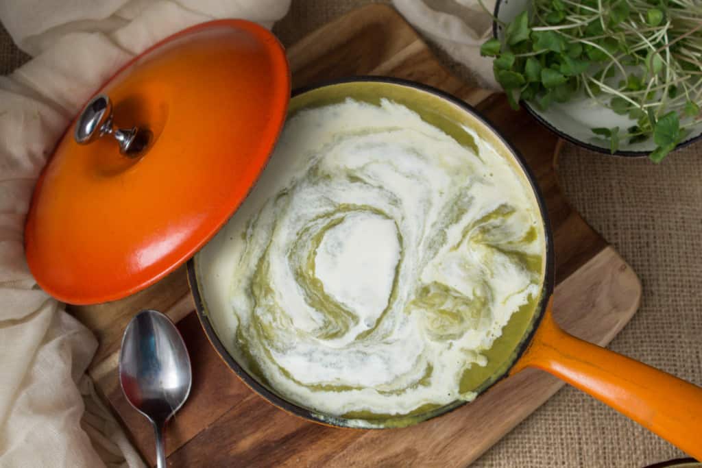 Creamy broccoli stems soup with salad topper crunch