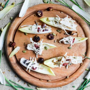 Endive spears with celery root remoulade, cranberries and pepitas (V, Paleo, GF)