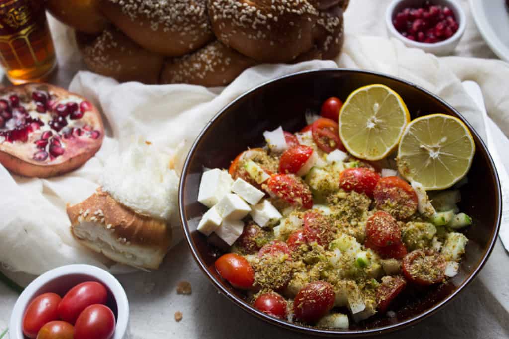 One of my family's favourite breakfast dishes is a fresh Israeli chopped salad with feta, za'atar and sumac. It's quick, easy, and perfect for additions.