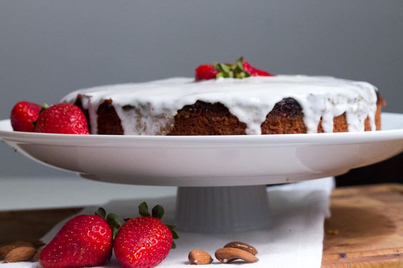 This lemon almond yogurt cake requires no special occasion, and minimal work. It's perfect to celebrate the weekend, especially if topped with strawberries.
