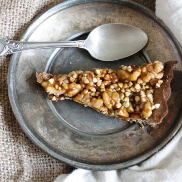 This walnut and buckwheat caramel tart is a perfect pairing of sweet and salty flavours, and crispy and silky textures. Gluten-free, dairy-free.