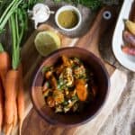 Carrots and bowl or greens