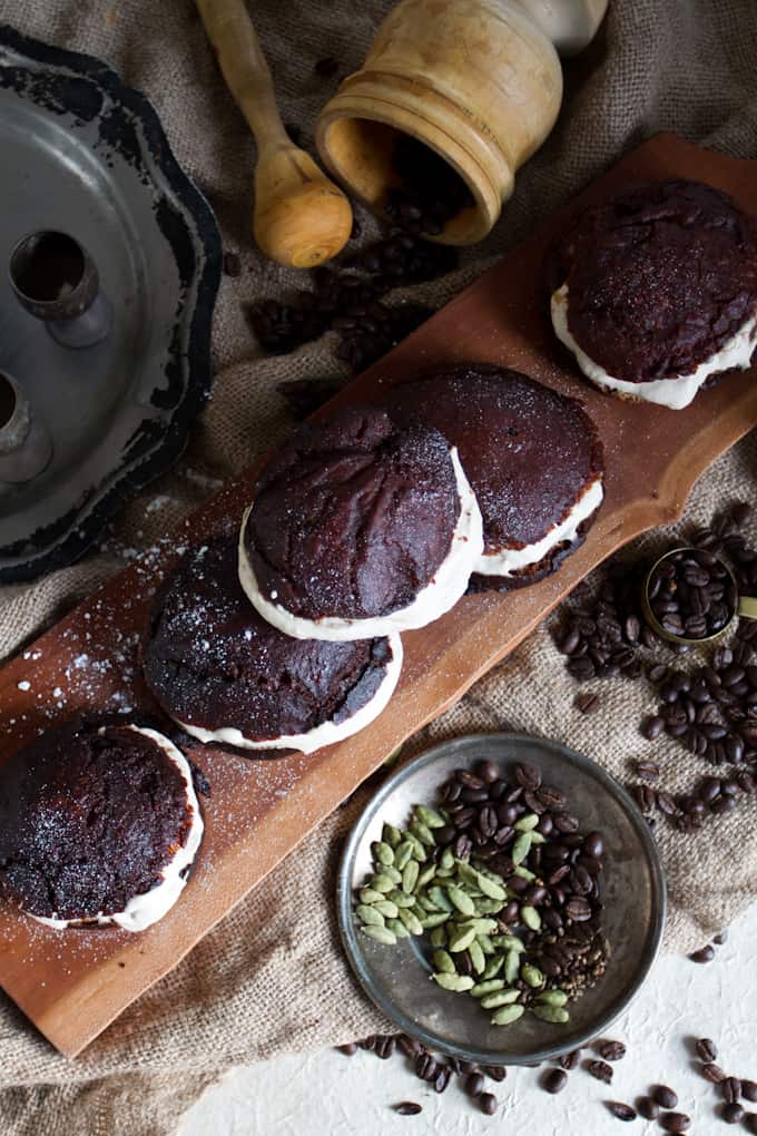 In these gluten-free sufganiyot with cardamom coffee cream, the coffee is paired with gently sweetened cream and piped into freshly fried Jewish donuts. 