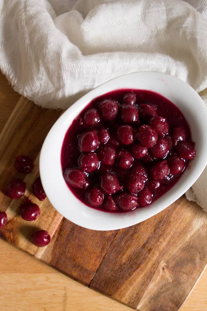 Tart and sweet Russian sour cherry sauce for blintzes, cake, pancakes, or just to eat with a spoon.