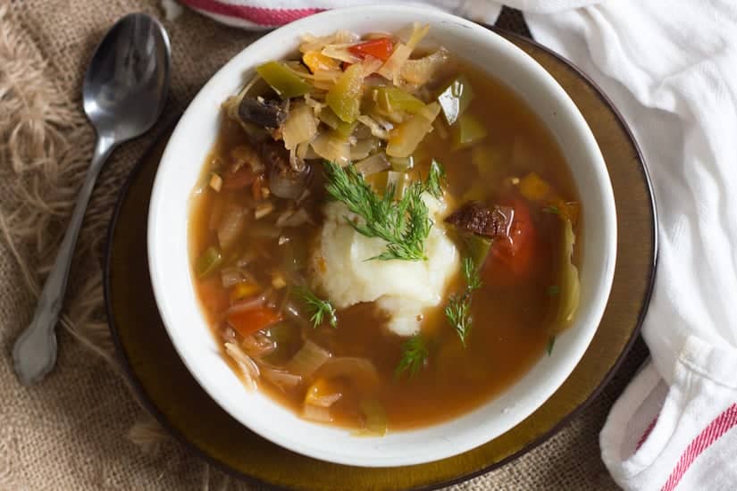 This Slovakian sauerkraut soup is tangy and rich in flavour, full of plump mushrooms and juicy strands of cabbage. A full winter meal!