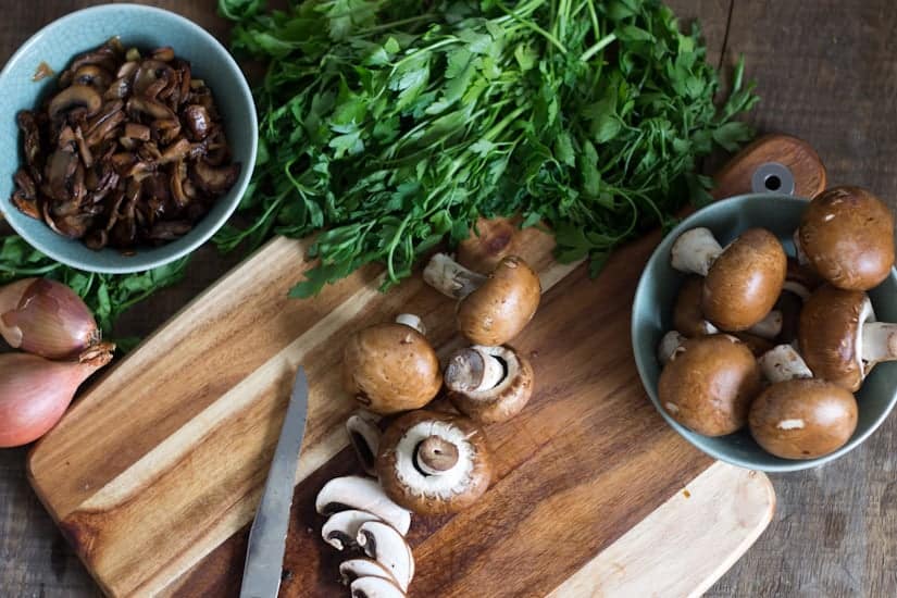 Mushroom bourekas are flaky phyllo dough pockets, filled with a salty, sweet and earthy mixture of mushrooms and caramelized onions.