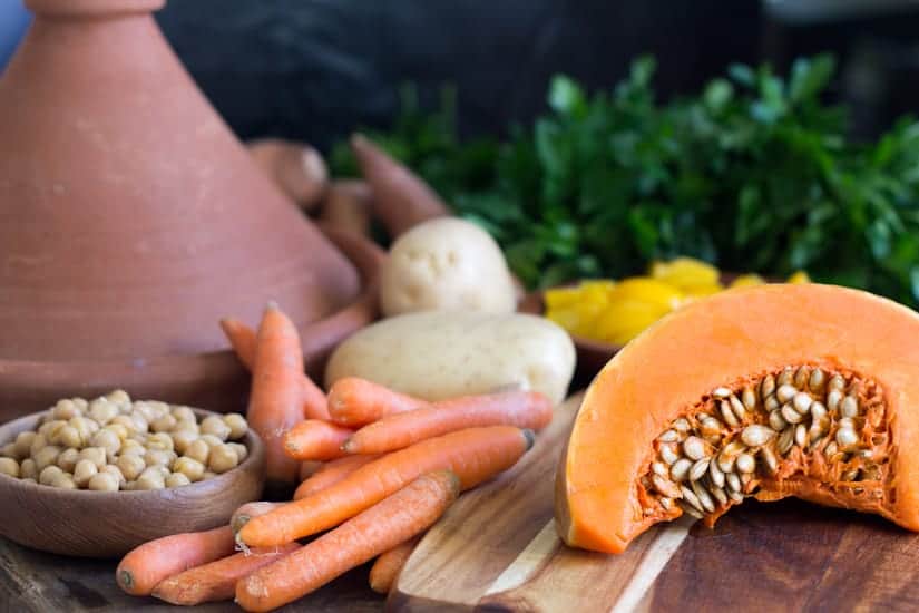 This orange vegetables tagine with peaches is an earthy dish, full of grounding flavours like yam, pumpkin, chickpeas, harissa, raisins and peaches. The perfect juxtaposition of sweet and savoury! 