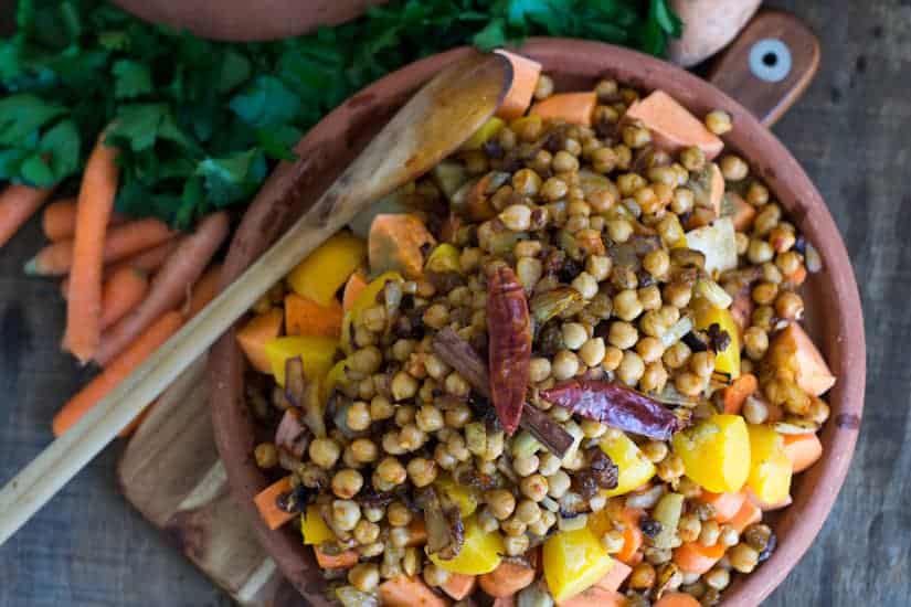 This orange vegetables tagine with peaches is an earthy dish, full of grounding flavours like yam, pumpkin, chickpeas, harissa, raisins and peaches. The perfect juxtaposition of sweet and savoury! 