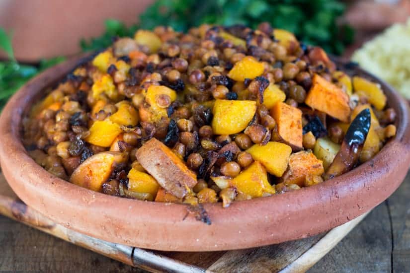 This orange vegetables tagine with peaches is an earthy dish, full of grounding flavours like yam, pumpkin, chickpeas, harissa, raisins and peaches. The perfect juxtaposition of sweet and savoury! 