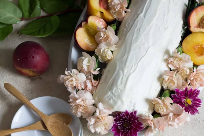 This gluten-free peach swiss roll cake is beautiful and special and oh-so-quaint, like a vision from the ’80s making its way into modern life.