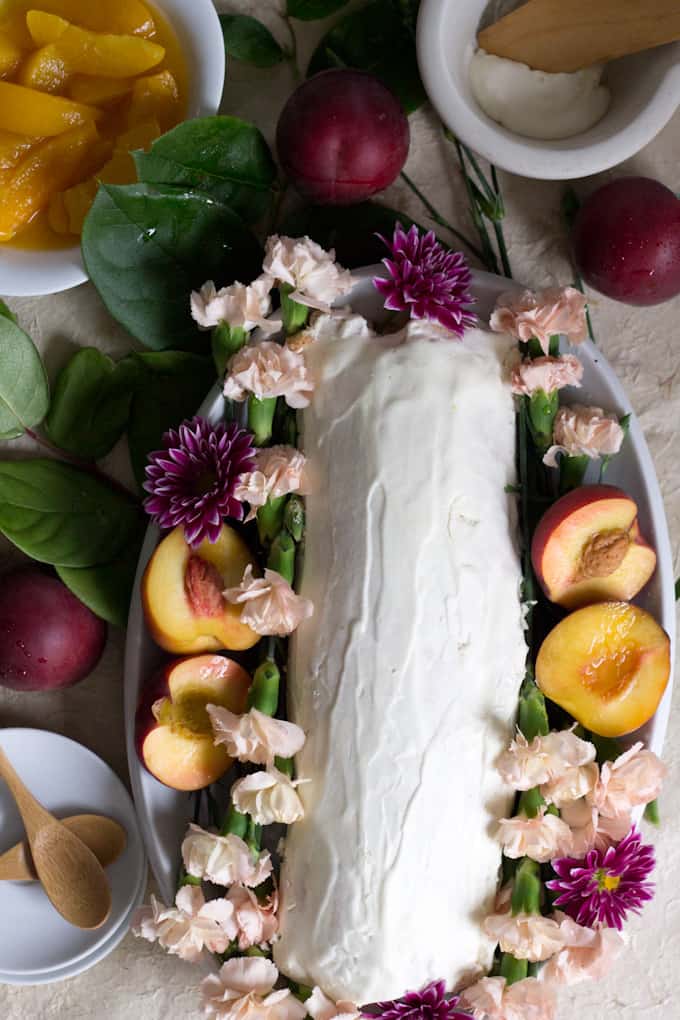 This gluten-free peach swiss roll cake is beautiful and special and oh-so-quaint, like a vision from the ’80s making its way into modern life.