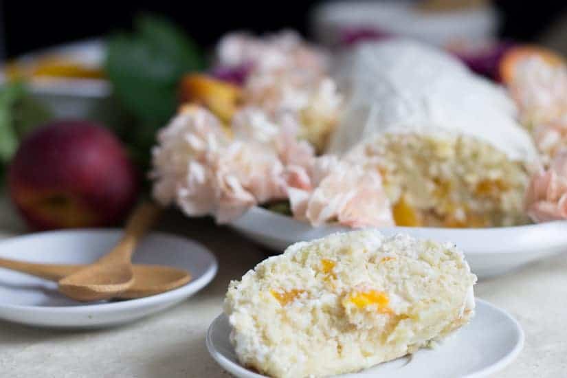 This gluten-free peach swiss roll cake is beautiful and special and oh-so-quaint, like a vision from the ’80s making its way into modern life.