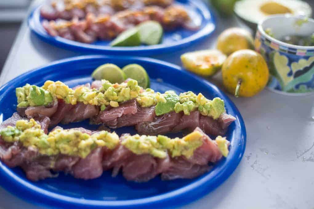 Tuna carpaccio with avocado and passion fruit