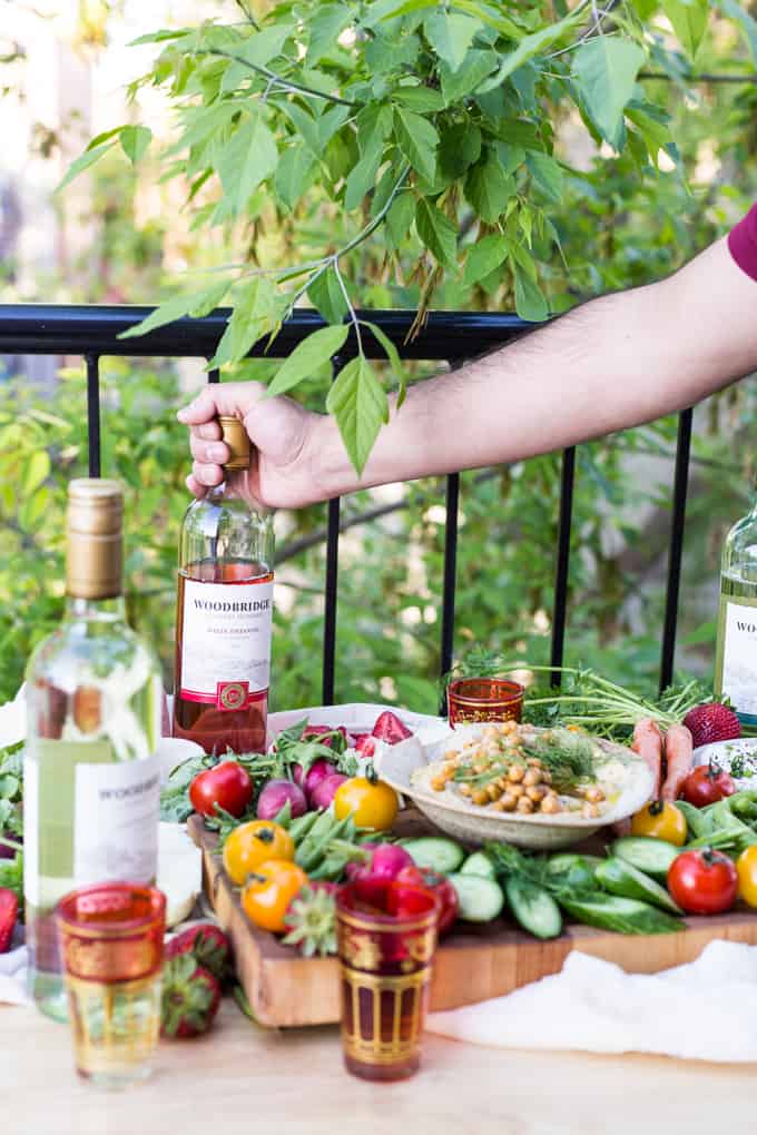 Recipes for easy springtime Middle Eastern entertaining with wine: spring hummus with crispy chickpeas, goat cheese with herbs and wine-soaked strawberries {GF, Veg, V}