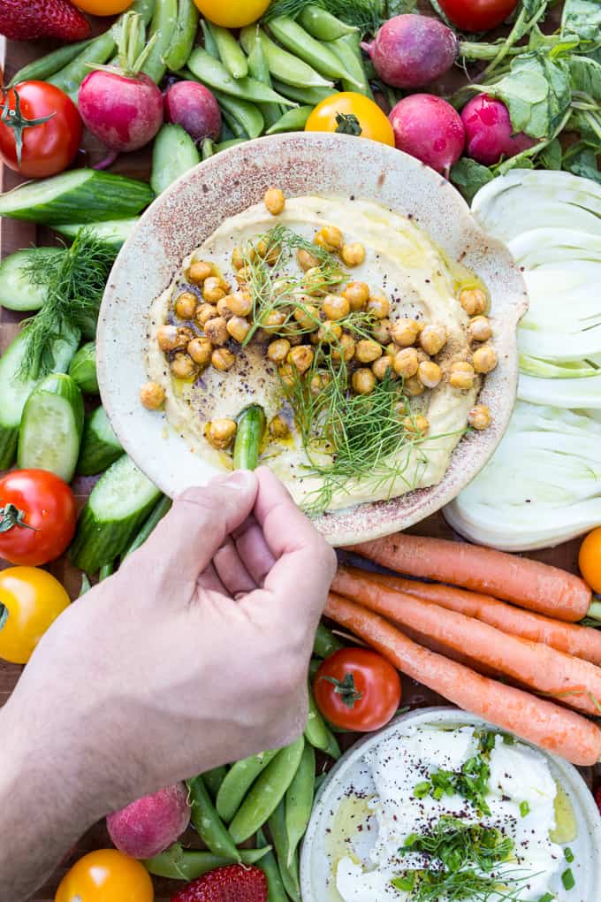 Recipes for easy springtime Middle Eastern entertaining with wine: spring hummus with crispy chickpeas, goat cheese with herbs and wine-soaked strawberries {GF, Veg, V}