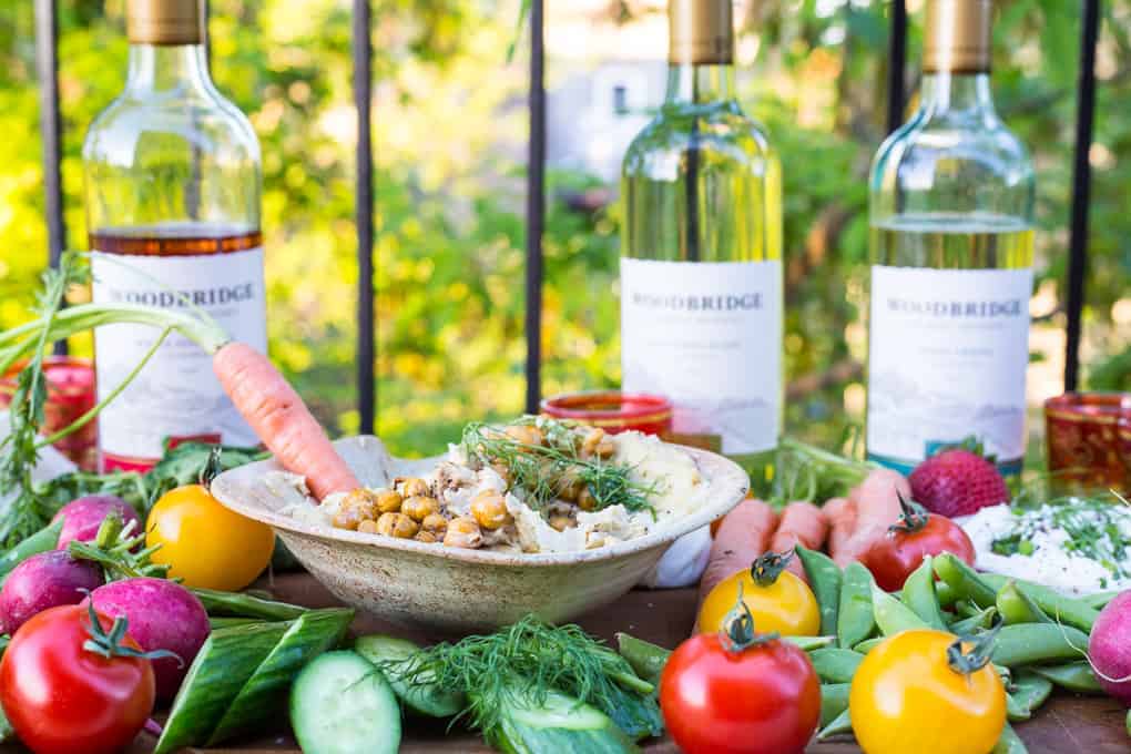 Recipes for easy springtime Middle Eastern entertaining with wine: spring hummus with crispy chickpeas, goat cheese with herbs and wine-soaked strawberries {GF, Veg, V}