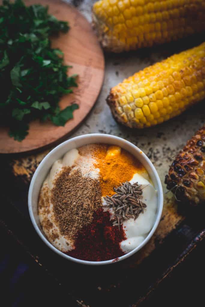 spices, close up, corn in background