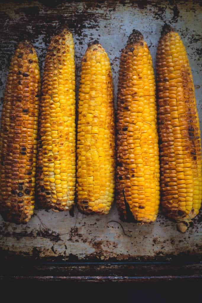 five corns laid out in a row, vertical