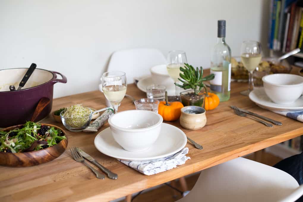 soup, salad and set table with wine