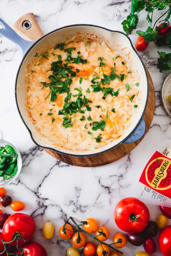 close up on cheese shakshuka with cilantro