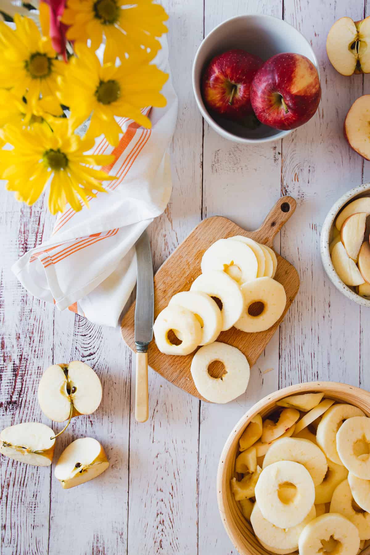 sliced Gala apples on cutting board