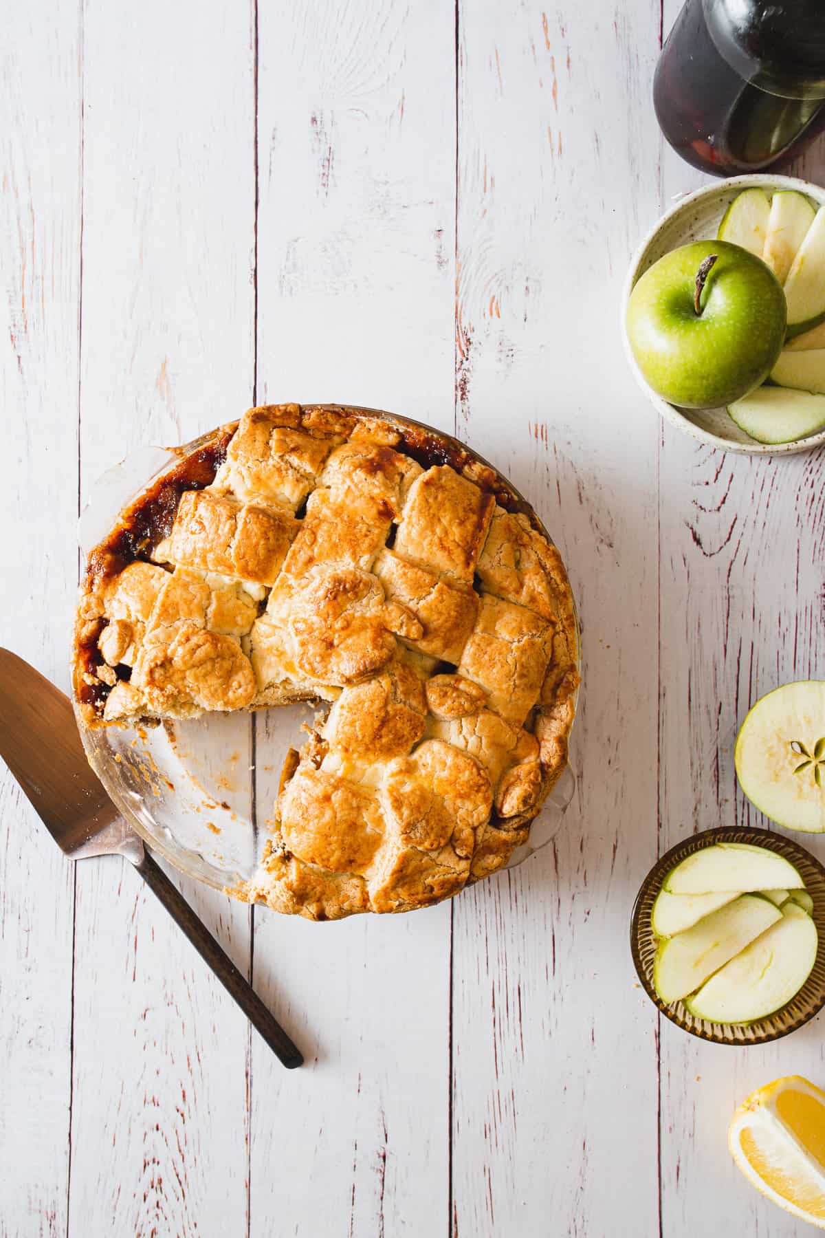 cutting a slice out of gluten free apple pie