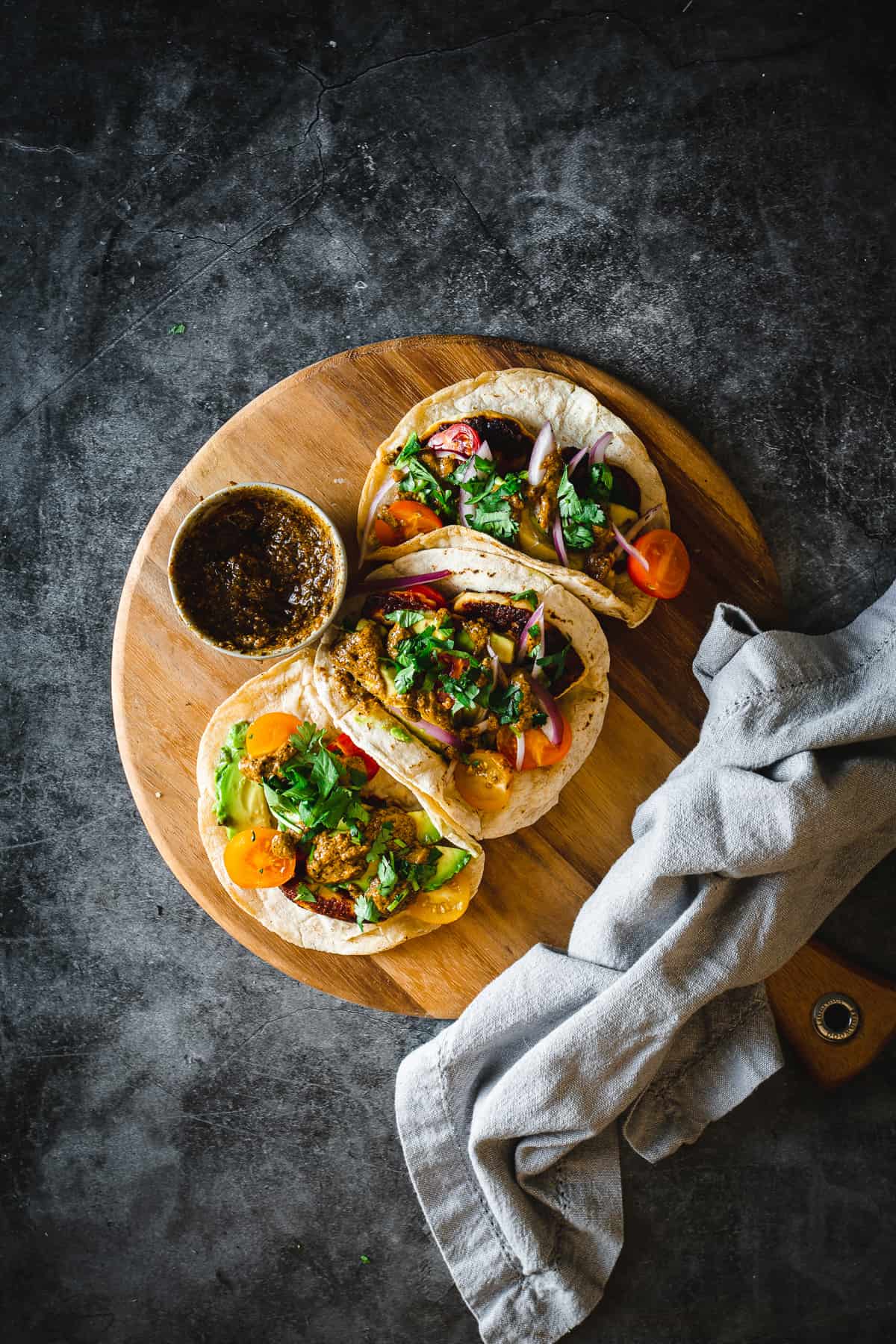 Halloumi Tacos With Pepita Salsa, Cherry Tomatoes, And Avocados