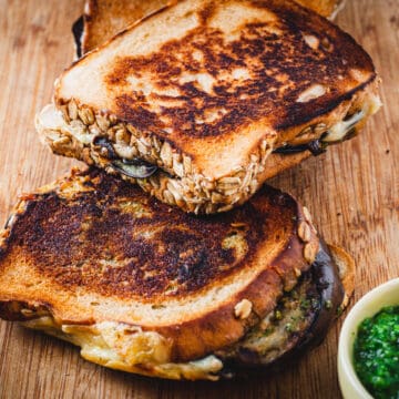 focus on grilled cheese sandwiches and bread knife