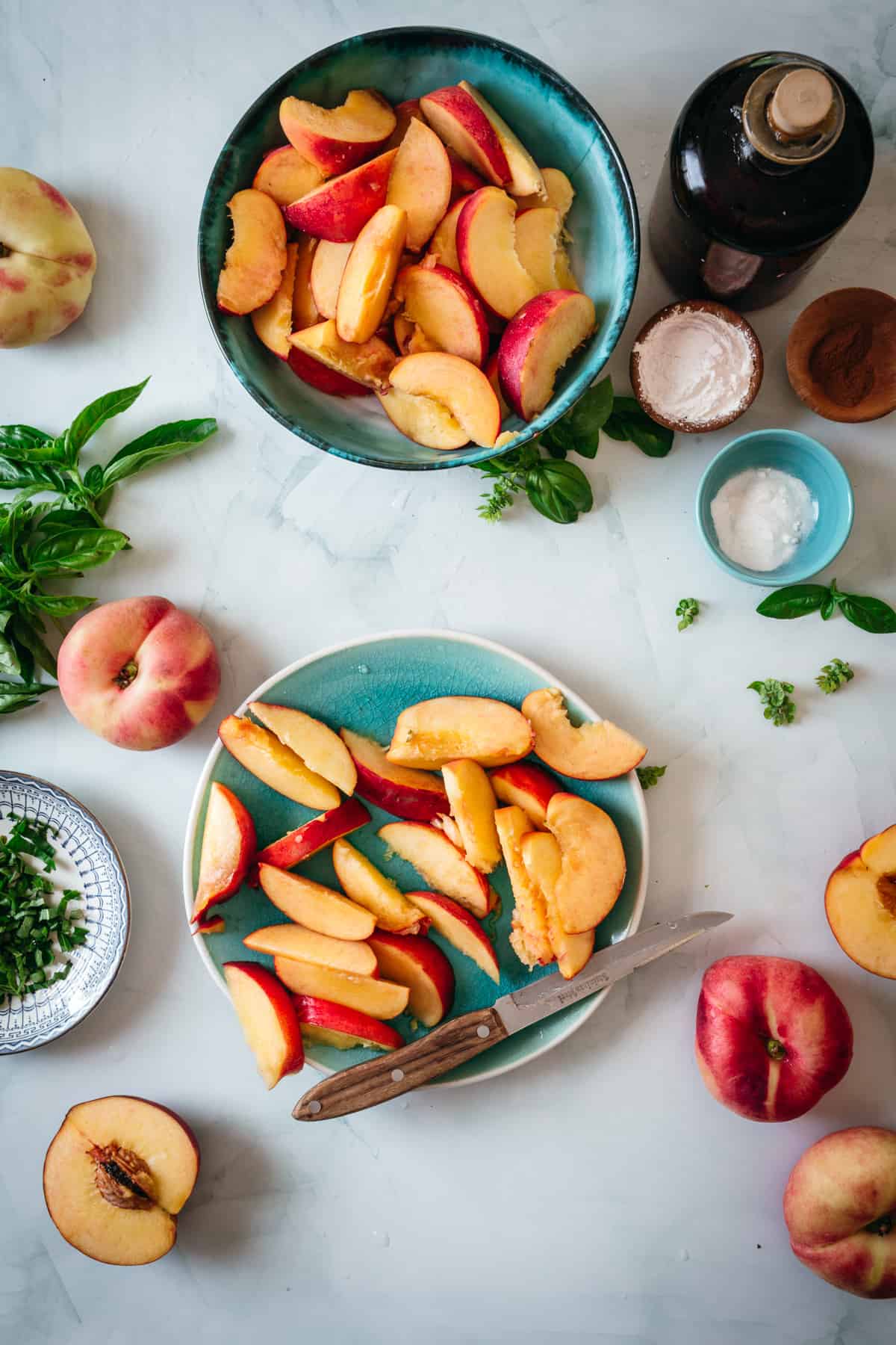 sliced peaches and basil