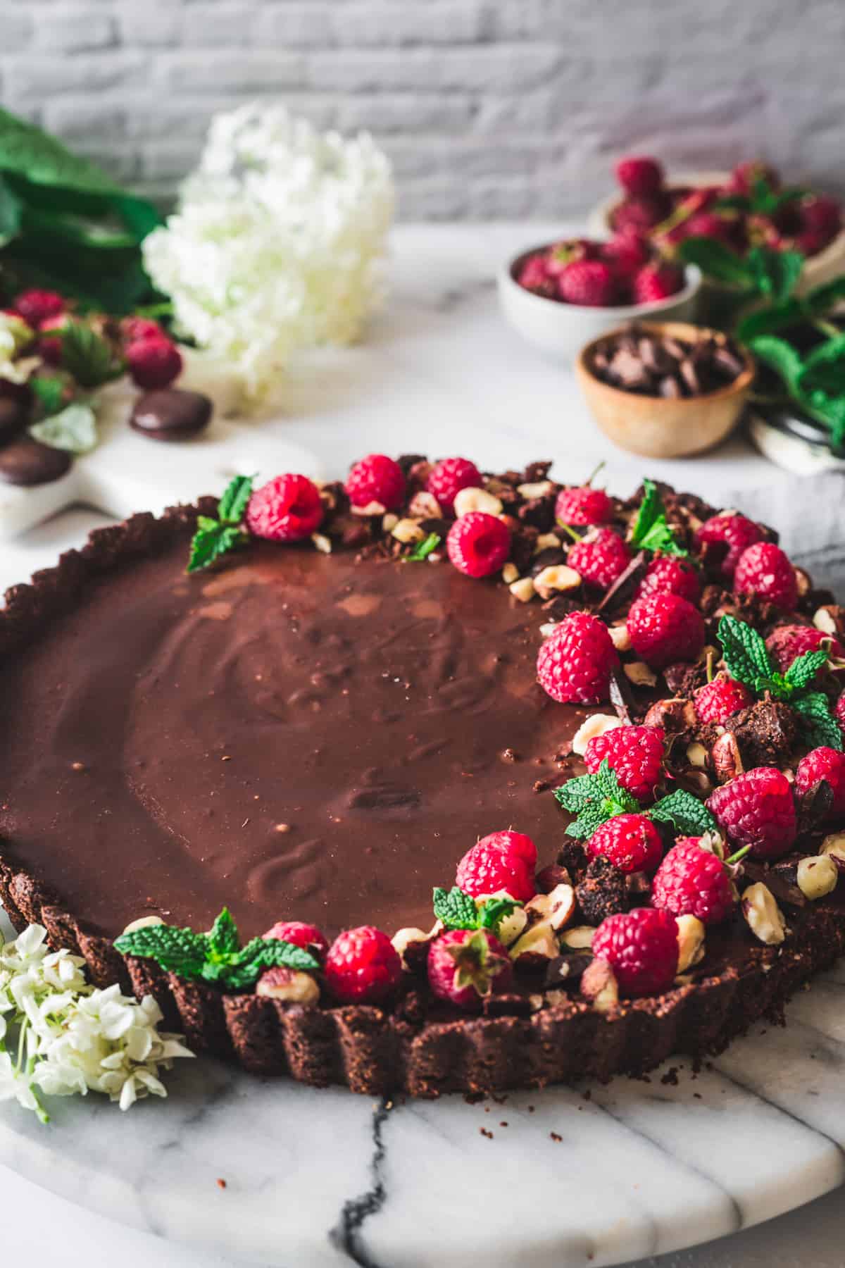 chocolate raspberry tart with toppings