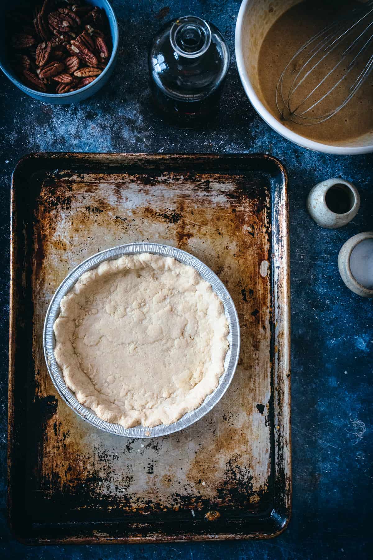 blind baked almond flour pie dough in pie pan