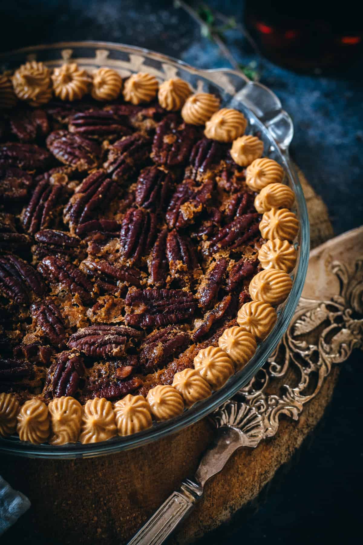 close up on gluten free pecan pie with knife