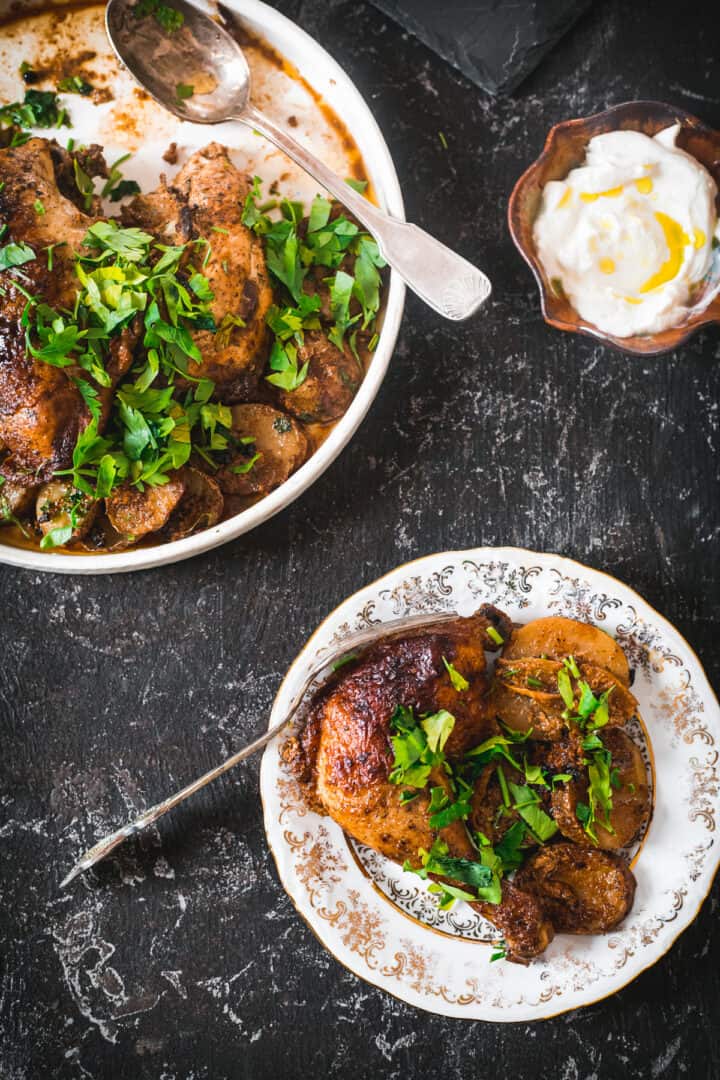 baked buttermilk chicken and potatoes, chicken on a plate and sour cream