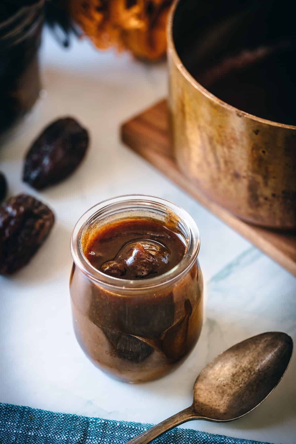 homemade date syrup in a jar