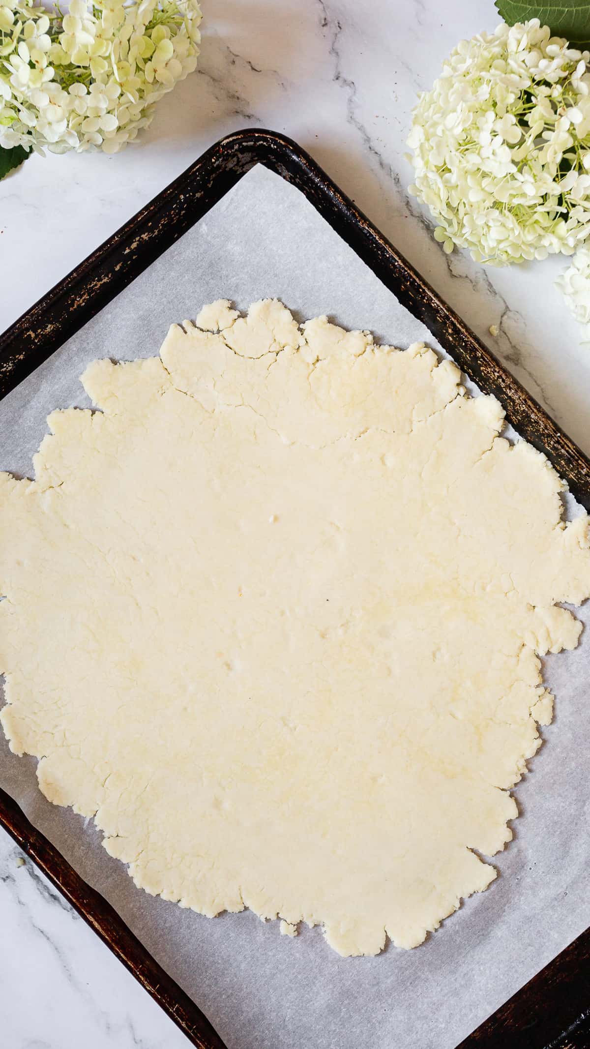 gluten free galette crust on baking sheet