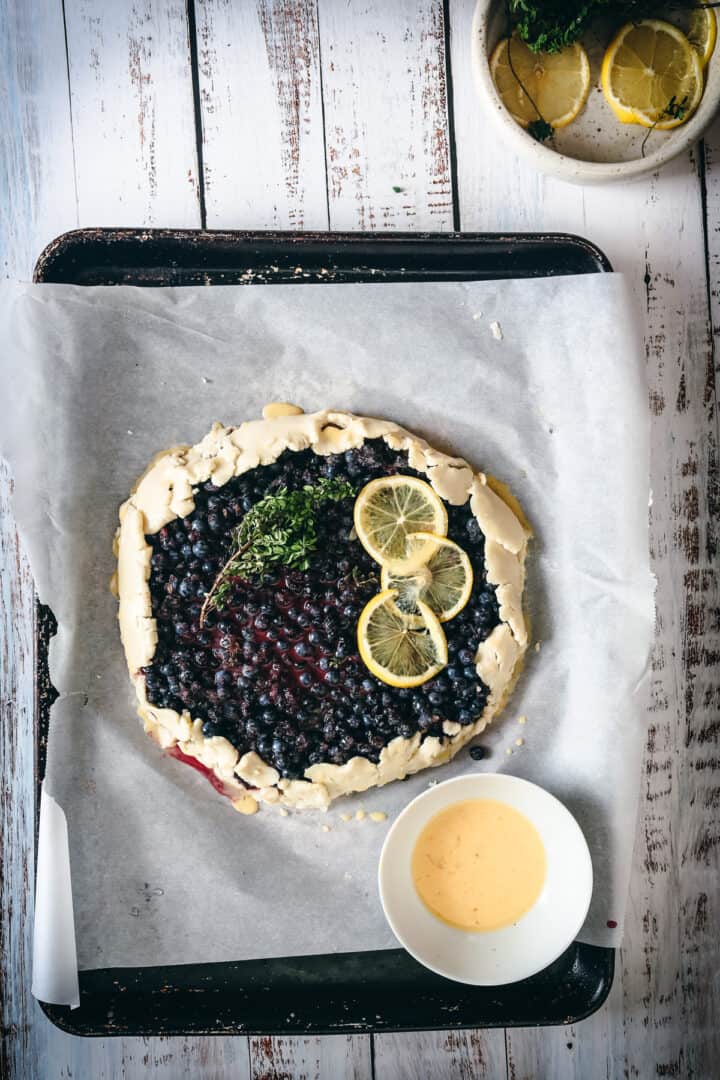 blueberry lemon galette on baking sheet ready for the oven