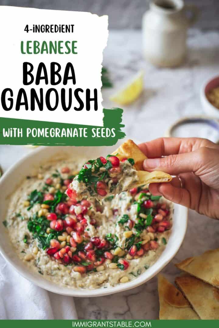 hand dipping pita into baba ganoush