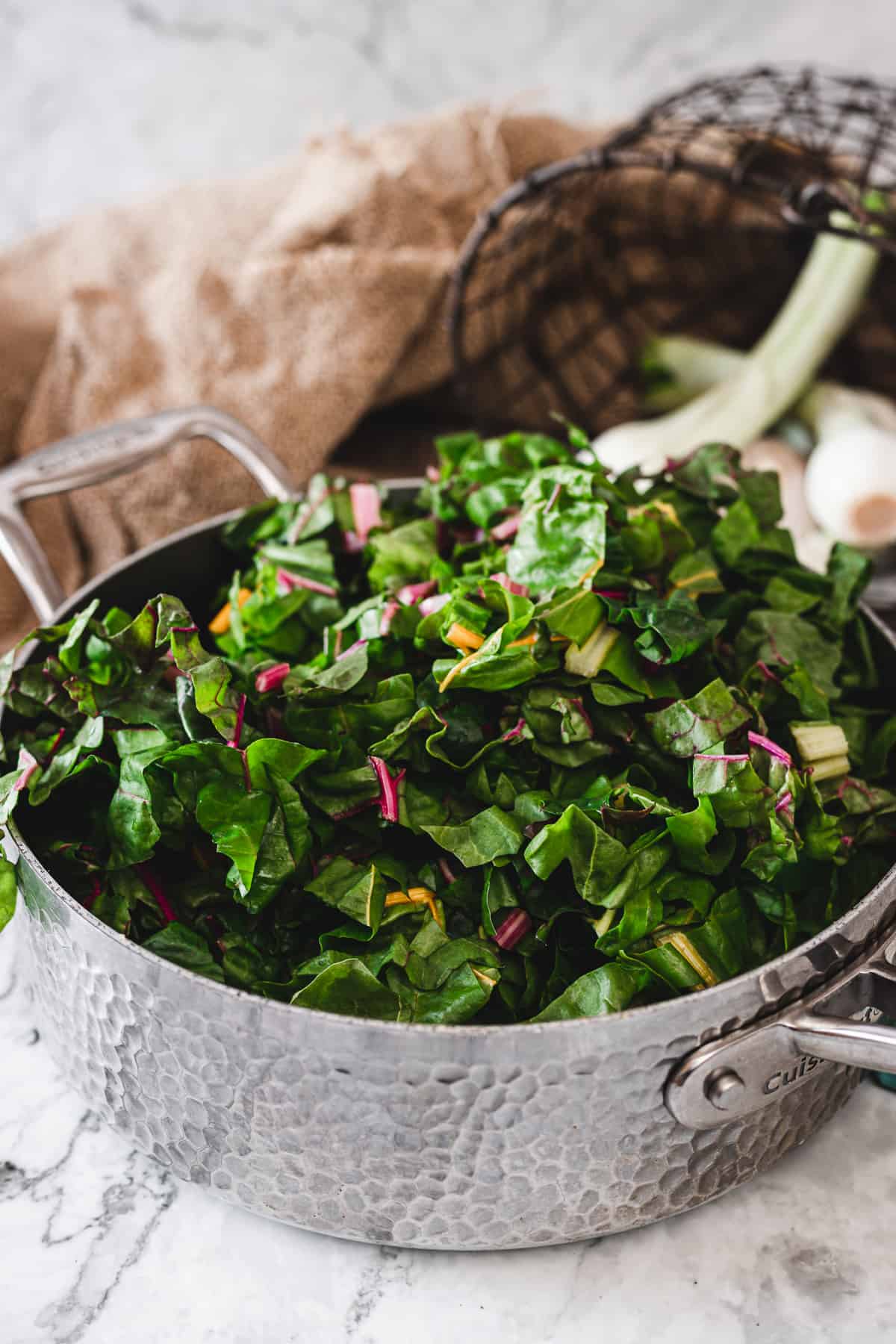 rainbow chard leaves in a pan