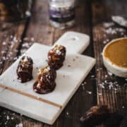 chocolate stuffed dates on cutting board
