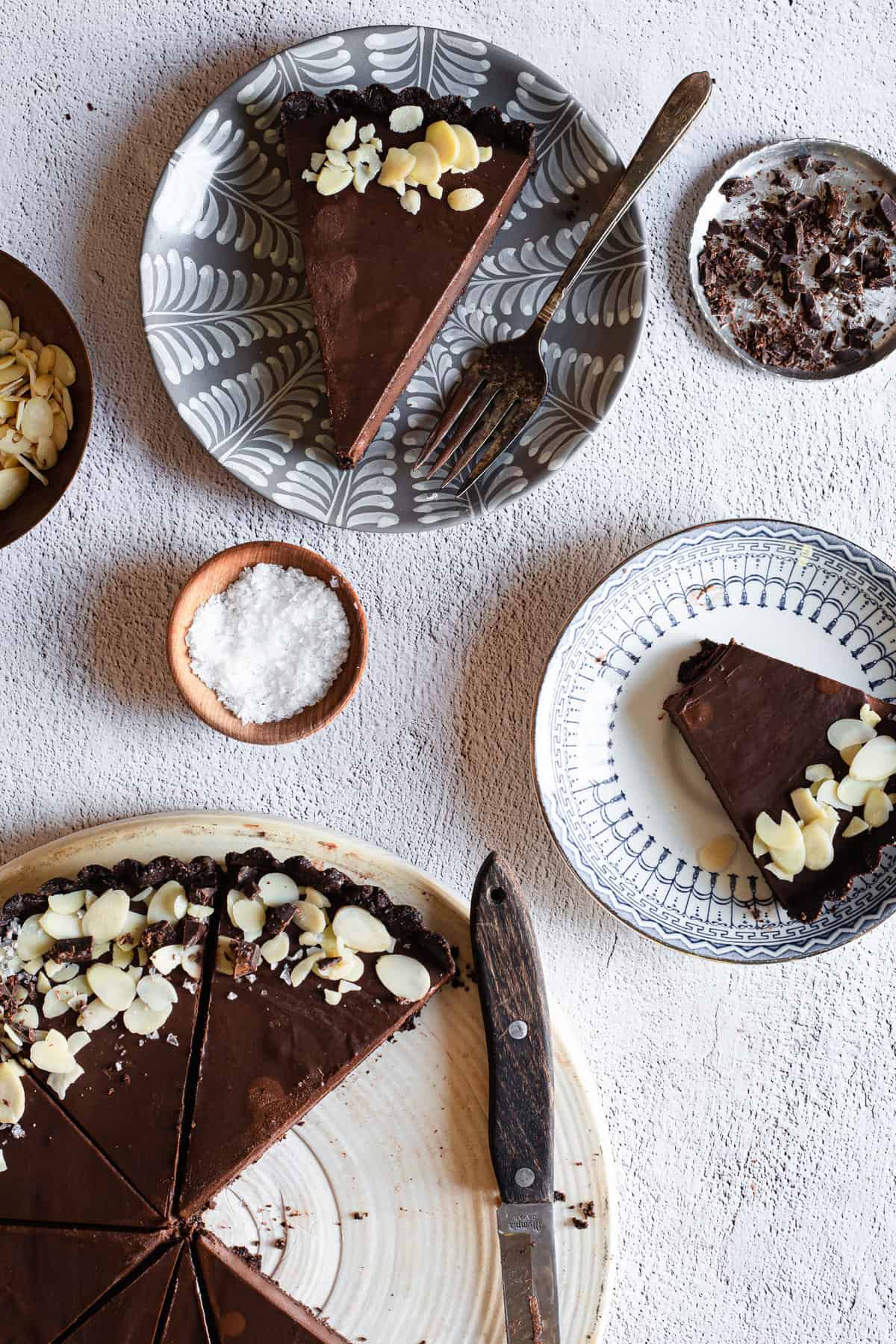 two slices removed from chocolate tart